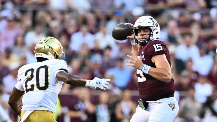 Aug 31, 2024; College Station, Texas, USA; Texas A&M Aggies quarterback Conner Weigman (15) looks to pass the ball during the first half against the Notre Dame Fighting Irish at Kyle Field. Mandatory Credit: Maria Lysaker-USA TODAY Sports