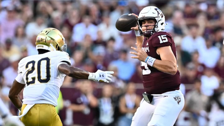 Aug 31, 2024; College Station, Texas, USA; Texas A&M Aggies quarterback Conner Weigman (15) looks to pass the ball during the first half against the Notre Dame Fighting Irish at Kyle Field. 