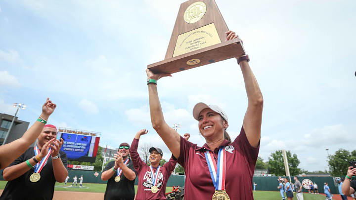 Calallen head softball coach Teresa Lentz hoists her third consecutive state championship trophy after the team defeated Andrews 9-2 in the Class 4A Division I UIL State Championship game on May 30, 2025, at Red & Charline McCombs Field in Austin. Calallen head softball coach Teresa Lentz hoists her third consecutive state championship trophy after the team defeated Andrews 9-2 in the Class 4A Division I UIL State Championship game on May 30, 2025, at Red & Charline McCombs Field in Austin.