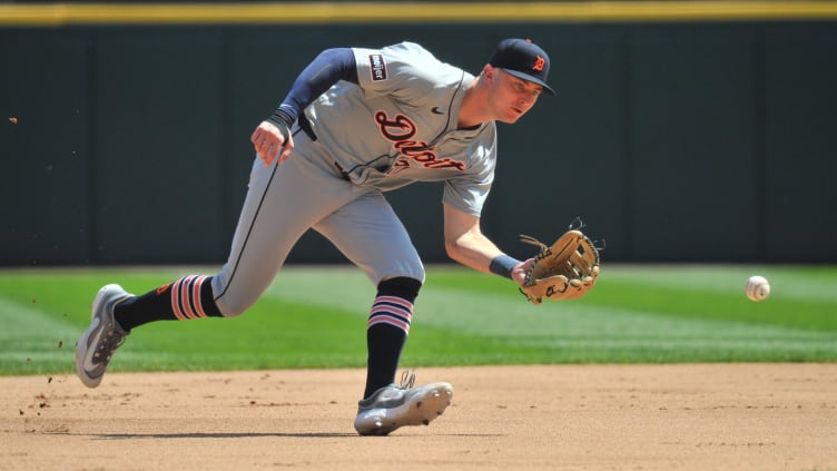 Aug 25, 2024; Chicago, Illinois, USA; Detroit Tigers shortstop Trey Sweeney (27) fields a ground ball hit by Chicago White Sox right fielder Corey Julks (not pictured) during the first inning at Guaranteed Rate Field. Mandatory Credit: Patrick Gorski-USA TODAY Sports