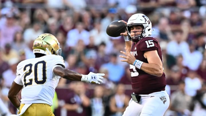 Aug 31, 2024; College Station, Texas, USA; Texas A&M Aggies quarterback Conner Weigman (15) looks to pass the ball during the first half against the Notre Dame Fighting Irish at Kyle Field. Mandatory Credit: Maria Lysaker-USA TODAY Sports