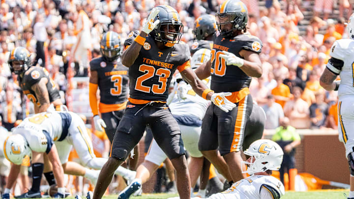 Tennessee defensive back Boo Carter (23) celebrates after sacking Chattanooga quarterback Chase Artopoeus (9) during Tennessee's game against Chattanooga in Neyland Stadium in Knoxville on Saturday, Aug. 31, 2024.