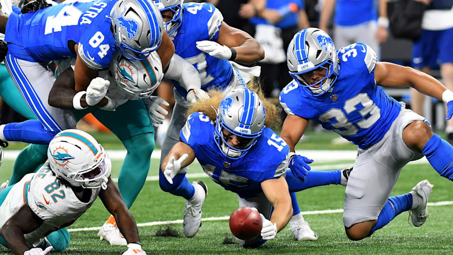 Detroit Lions special team players Grant Stuard (15), Shane Zylstra (84), and Sione Vaki (33) battle for possession of the ball  | Eamon Horwedel-Imagn Images