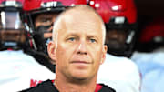 Sep 11, 2025; Winston-Salem, North Carolina, USA;  North Carolina State Wolfpack head coach Dave Doeren walks his team out on the field against the Wake Forest Demon Deacons at Allegacy Federal Credit Union Stadium. Mandatory Credit: Luke Jamroz-Imagn Images