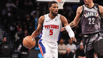 Jan 8, 2025; Brooklyn, New York, USA;  Detroit Pistons guard Malik Beasley (5) looks to drive past Brooklyn Nets forward Jalen Wilson (22) in the first quarter at Barclays Center. Mandatory Credit: Wendell Cruz-Imagn Images