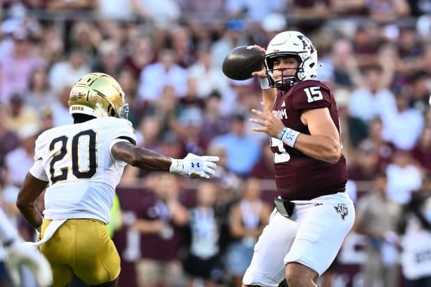 Texas A&M Aggies quarterback Conner Weigman (15) looks to pass the ball during the first half against Notre Dame.