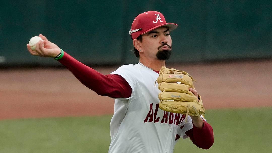 April 21, 2026; Tuscaloosa, AL, USA; Alabama third baseman Jason Torres (32) throws to first during the game with UAB at Sewell-Thomas Stadium.