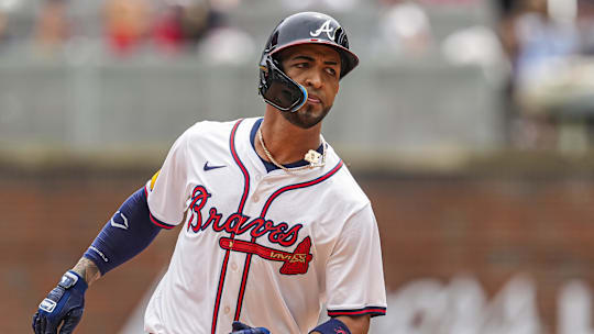 Eddie Rosario trots around the bases after a 2024 home run.