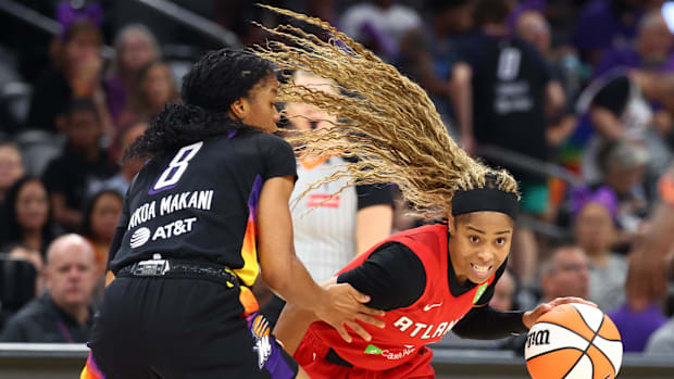 Monique Akoa Makani defending Jordin Canada