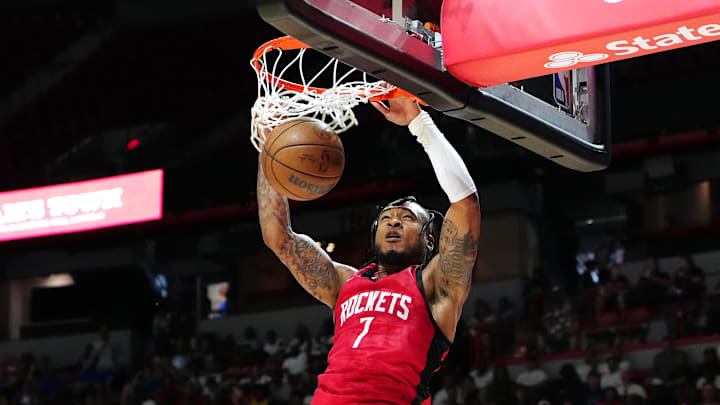 Jul 14, 2024; Las Vegas, NV, USA; Houston Rockets forward Cam Whitmore (7) dunks against the Washington Wizards during the fourth quarter at Thomas & Mack Center. Mandatory Credit: Stephen R. Sylvanie-Imagn Images