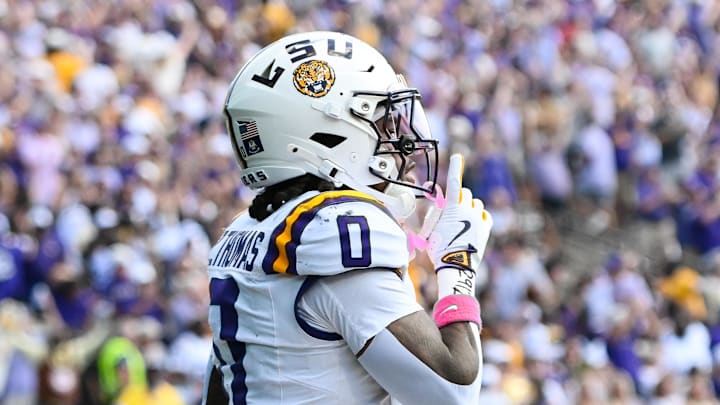 Oct 18, 2025; Nashville, Tennessee, USA;  Louisiana State Tigers wide receiver Zavion Thomas (0) celebrates with his teammates after scoring a touchdown against the Vanderbilt Commodores during the second half at FirstBank Stadium. Mandatory Credit: Steve Roberts-Imagn Images