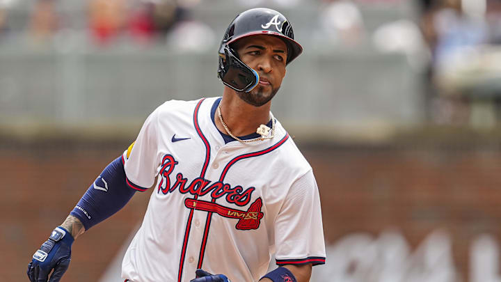 Atlanta Braves left fielder Eddie Rosario rounds the bases after hitting a home run against the St. Louis Cardinals.