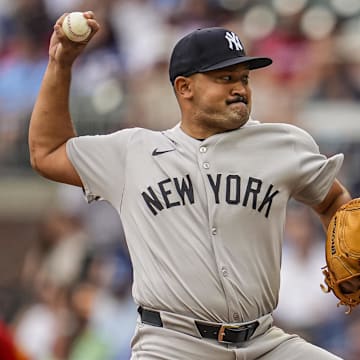 Jul 18, 2025; Cumberland, Georgia, USA; New York Yankees relief pitcher Rico Garcia (50) pitches against the Atlanta Braves during the second inning at Truist Park. Mandatory Credit: Dale Zanine-Imagn Images