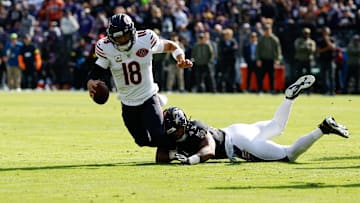 Oct 26, 2025; Baltimore, Maryland, USA; Chicago Bears quarterback Caleb Williams (18) is sacked by Baltimore Ravens linebacker Mike Green (45) during the first quarter at M&T Bank Stadium. Mandatory Credit: Geoff Burke-Imagn Images
