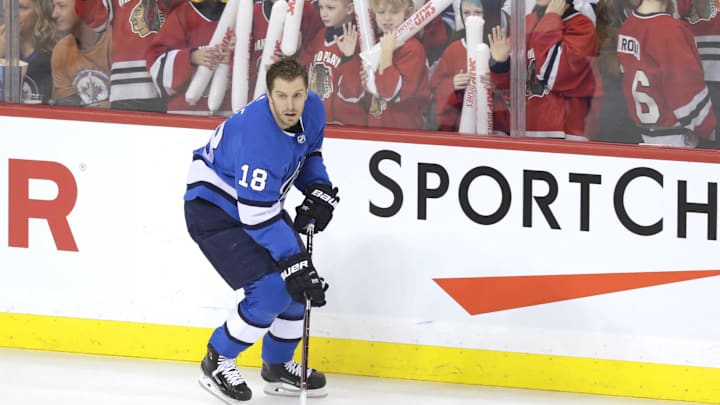 Feb 2, 2019; Winnipeg, Manitoba, CAN; Winnipeg Jets center Bryan Little (18) skates past fans before a game against the Anaheim Ducks at Bell MTS Place. Mandatory Credit: James Carey Lauder-Imagn Images Feb 2, 2019; Winnipeg, Manitoba, CAN; Winnipeg Jets center Bryan Little (18) skates past fans before a game against the Anaheim Ducks at Bell MTS Place. Mandatory Credit: James Carey Lauder-Imagn Images
