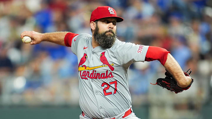 Aug 9, 2024; Kansas City, Missouri, USA; St. Louis Cardinals relief pitcher Andrew Kittredge (27) pitches during the eighth inning against the Kansas City Royals at Kauffman Stadium.