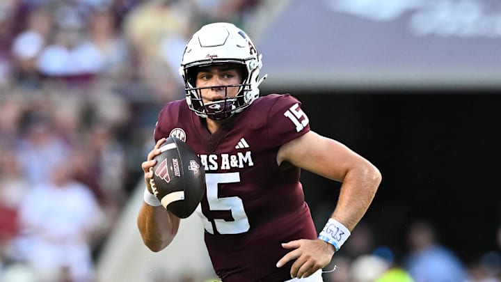 Aug 31, 2024; College Station, Texas, USA; Texas A&M Aggies quarterback Conner Weigman (15) runs the ball during the first half against the Notre Dame Fighting Irish at Kyle Field. Mandatory Credit: Maria Lysaker-Imagn Images