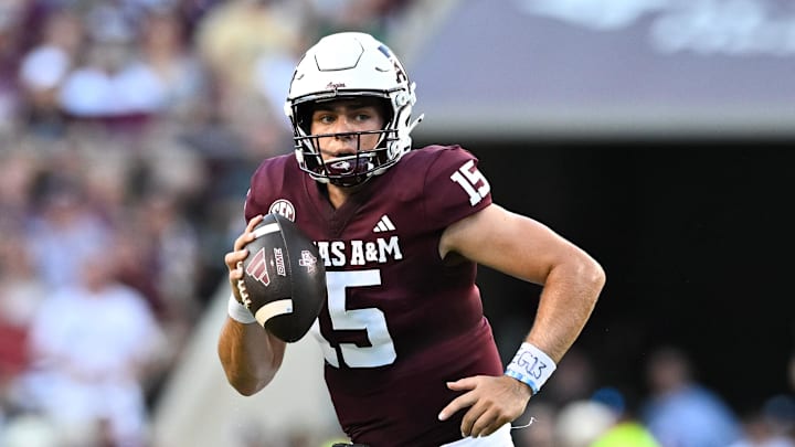 Aug 31, 2024; College Station, Texas, USA; Texas A&M Aggies quarterback Conner Weigman (15) runs the ball during the first half against the Notre Dame Fighting Irish at Kyle Field. Mandatory Credit: Maria Lysaker-Imagn Images