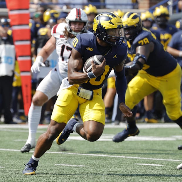 Michigan Wolverines football quarterback Alex Orji