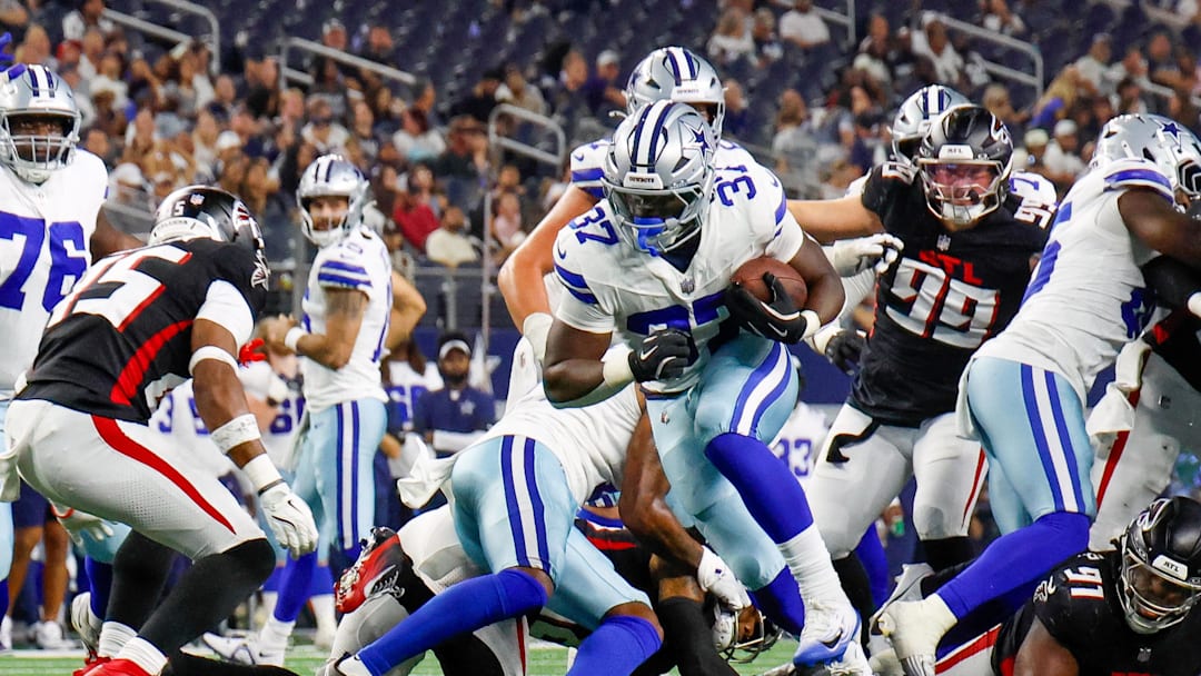 Aug 22, 2025; Arlington, Texas, USA; Dallas Cowboys running back Phil Mafah (37) breaks through the line during the fourth quarter against the Atlanta Falcons at AT&T Stadium. Mandatory Credit: Andrew Dieb-Imagn Images