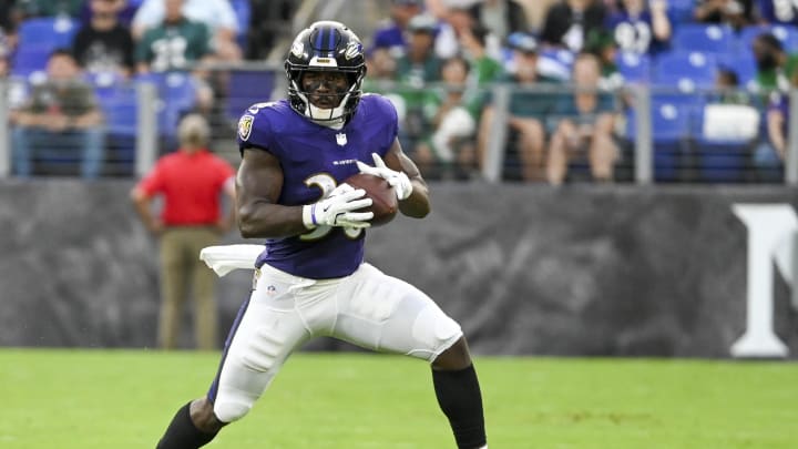 Aug 9, 2024; Baltimore, Maryland, USA;  Baltimore Ravens running back Owen Wright (36) runs after a catch during the first  quarter of a preseason game against the Philadelphia Eagles at M&T Bank Stadium. Mandatory Credit: Tommy Gilligan-USA TODAY Sports