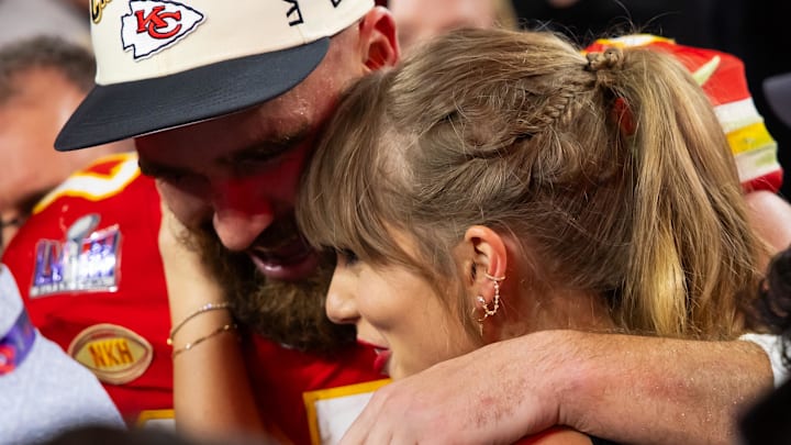 Feb 11, 2024; Paradise, Nevada, USA; Kansas City Chiefs tight end Travis Kelce (87) celebrates with girlfriend Taylor Swift after defeating the San Francisco 49ers in Super Bowl LVIII at Allegiant Stadium. 