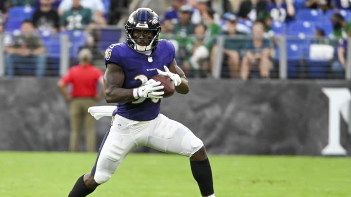 Aug 9, 2024; Baltimore, Maryland, USA;  Baltimore Ravens running back Owen Wright (36) runs after a catch during the first  quarter of a preseason game against the Philadelphia Eagles at M&T Bank Stadium. Mandatory Credit: Tommy Gilligan-USA TODAY Sports