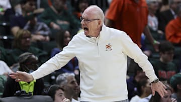 Jan 10, 2024; Coral Gables, Florida, USA; Miami Hurricanes head coach Jim Larranaga reacts toward his bench against the Louisville Cardinals during the second half at Watsco Center. Mandatory Credit: Sam Navarro-Imagn Images