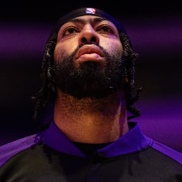 Jan 28, 2025; Philadelphia, Pennsylvania, USA; Los Angeles Lakers forward Anthony Davis stands for the anthem before action against the Philadelphia 76ers at Wells Fargo Center. Mandatory Credit: Bill Streicher-Imagn Images
