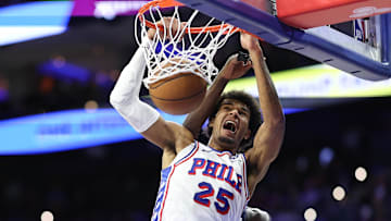 Oct 17, 2025; Philadelphia, Pennsylvania, USA; Philadelphia 76ers forward Dominick Barlow (25) dunks the ball against the Minnesota Timberwolves during the third quarter at Xfinity Mobile Arena. Mandatory Credit: Bill Streicher-Imagn Images