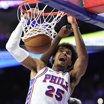 Oct 17, 2025; Philadelphia, Pennsylvania, USA; Philadelphia 76ers forward Dominick Barlow (25) dunks the ball against the Minnesota Timberwolves during the third quarter at Xfinity Mobile Arena. Mandatory Credit: Bill Streicher-Imagn Images