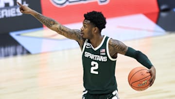 Mar 11, 2021; Indianapolis, Indiana, USA; Michigan State Spartans guard Rocket Watts (2) controls the ball against the Maryland Terrapins in the first half at Lucas Oil Stadium. Mandatory Credit: Aaron Doster-Imagn Images