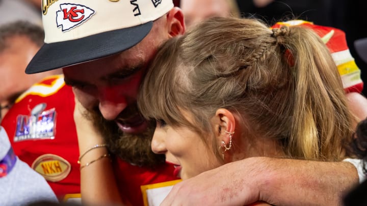 Feb 11, 2024; Paradise, Nevada, USA; Kansas City Chiefs tight end Travis Kelce (87) celebrates with girlfriend Taylor Swift after defeating the San Francisco 49ers in Super Bowl LVIII at Allegiant Stadium. Mandatory Credit: Mark J. Rebilas-USA TODAY Sports