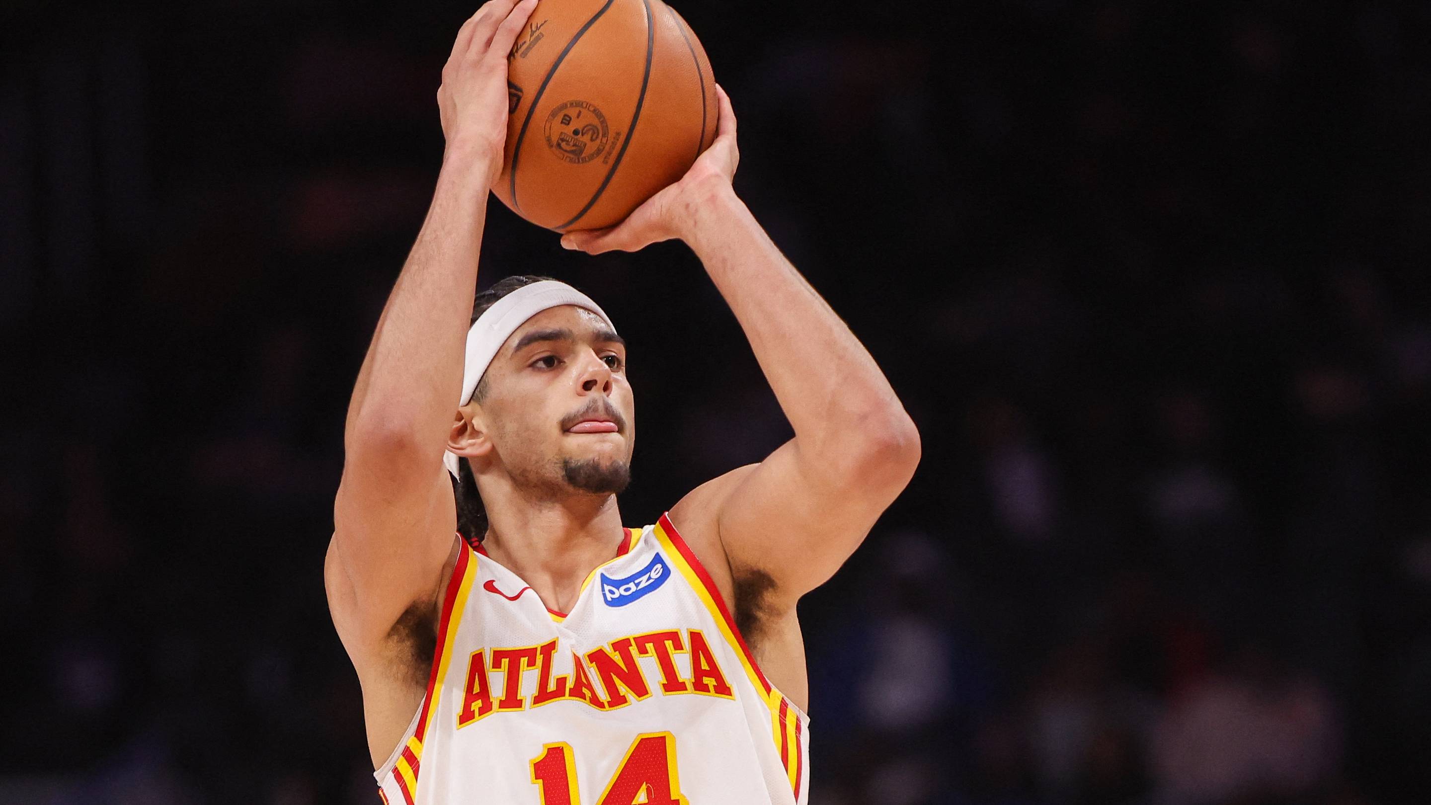 Feb 5, 2026; Atlanta, Georgia, USA; Atlanta Hawks forward Asa Newell (14) shoots against the Utah Jazz in the second quarter at State Farm Arena. Mandatory Credit: Brett Davis-Imagn Images