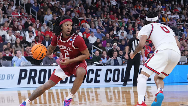 Mar 22, 2025; Providence, RI, USA; Arkansas Razorbacks guard Boogie Fland (2) dribbles against St. John's Red Storm guard Aaron Scott (0) during the second half of a second round men’s NCAA Tournament game at Amica Mutual Pavilion. Mandatory Credit: Gregory Fisher-Imagn Images
