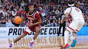 Mar 22, 2025; Providence, RI, USA; Arkansas Razorbacks guard Boogie Fland (2) dribbles against St. John's Red Storm guard Aaron Scott (0) during the second half of a second round men’s NCAA Tournament game at Amica Mutual Pavilion. Mandatory Credit: Gregory Fisher-Imagn Images