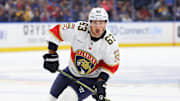 Oct 18, 2025; Buffalo, New York, USA;  Florida Panthers left wing Brad Marchand (63) looks to pass during the first period against the Buffalo Sabres at KeyBank Center. Mandatory Credit: Timothy T. Ludwig-Imagn Images