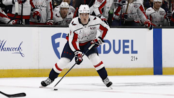 Apr 1, 2025; Boston, Massachusetts, USA; Washington Capitals right wing Ryan Leonard (9) carries the puck against the Boston Bruins during the first period at TD Garden. Mandatory Credit: Winslow Townson-Imagn Images