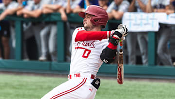 Nebraska second baseman Cayden Brumbaugh launches a home run against Holy Cross in the Chapel Hill Regional.