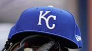 Jul 30, 2021; Toronto, Ontario, CAN; A Kansas City Royals hat and glove in the dugout during a game against the Toronto Blue Jays at Rogers Centre. 