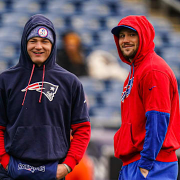 Jan 5, 2025; Foxborough, Massachusetts, USA; Buffalo Bills quarterback Josh Allen (17) and New England Patriots quarterback Drake Maye (10) talk on the field before the start of the game at Gillette Stadium. Mandatory Credit: David Butler II-Imagn Images