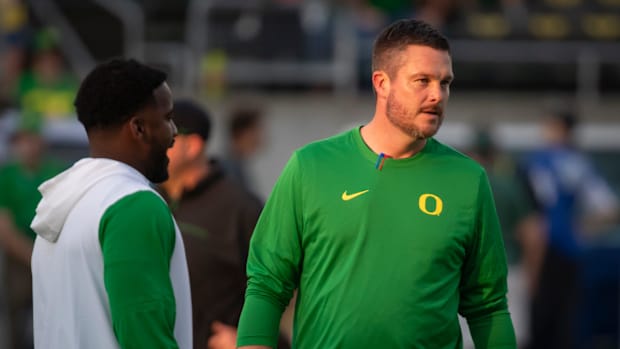 Oregon head coach Dan Lanning walks the field ahead of the game as the Oregon Ducks host the Boise State Broncos