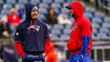 Jan 5, 2025; Foxborough, Massachusetts, USA; Buffalo Bills quarterback Josh Allen (17) and New England Patriots quarterback Drake Maye (10) talk on the field before the start of the game at Gillette Stadium. Mandatory Credit: David Butler II-Imagn Images