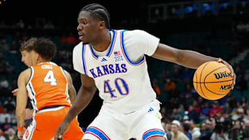 Nov 25, 2025; Las Vegas, Nevada, USA; Kansas Jayhawks forward Flory Bidunga (40) dribbles the ball against the Syracuse Orange during the first half in a 2025 Players Era Festival group play game at MGM Grand Garden Arena. Mandatory Credit: Stephen R. Sylvanie-Imagn Images