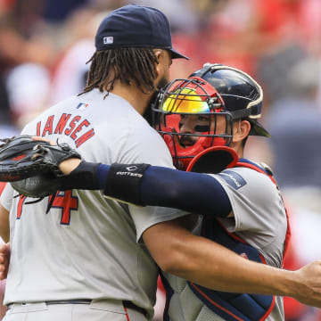 Jun 23, 2024; Cincinnati, Ohio, USA; Boston Red Sox pitcher Kenley Jansen (74) hugs catcher Connor Wong (12) after the victory over the Cincinnati Reds at Great American Ball Park. Mandatory Credit: Katie Stratman-USA TODAY Sports