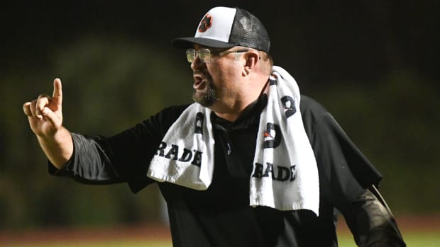 Cocoa Tigers football head coach Ryan Schneider reacts to a penalty during the game against Dunnellon