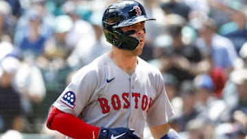 Jun 18, 2025; Seattle, Washington, USA; Boston Red Sox third baseman Marcelo Mayer (39) shakes hands with second baseman David Hamilton (17) after hitting a solo-home run against the Seattle Mariners during the second inning at T-Mobile Park. Mandatory Credit: Joe Nicholson-Imagn Images