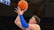 Dec 3, 2025; Seattle, Washington, USA; UCLA Bruins forward Tyler Bilodeau (34) shoots the ball against the Washington Huskies during the second half at Alaska Airlines Arena at Hec Edmundson Pavilion. Mandatory Credit: Steven Bisig-Imagn Images