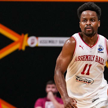 Assembly Ball guard Yogi Ferrell dribbles the ball up the court Tuesday, July 23, 2024, during the final matchup of The Basketball Tournament at Hinkle Fieldhouse in Indianapolis.