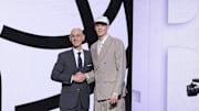 Jun 25, 2025; Brooklyn, NY, USA;  Egor Demin stands with NBA commissioner Adam Silver after being selected as the eighth pick by the Brooklyn Nets in the first round of the 2025 NBA Draft at Barclays Center. Mandatory Credit: Brad Penner-Imagn Images